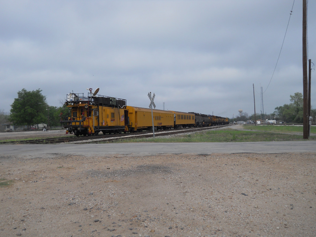 LMIX 315  1Apr2011  Support Car on the back of Loram Rail Grinder Train (RG 15) in the yard 